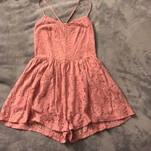 Pink lace romper.